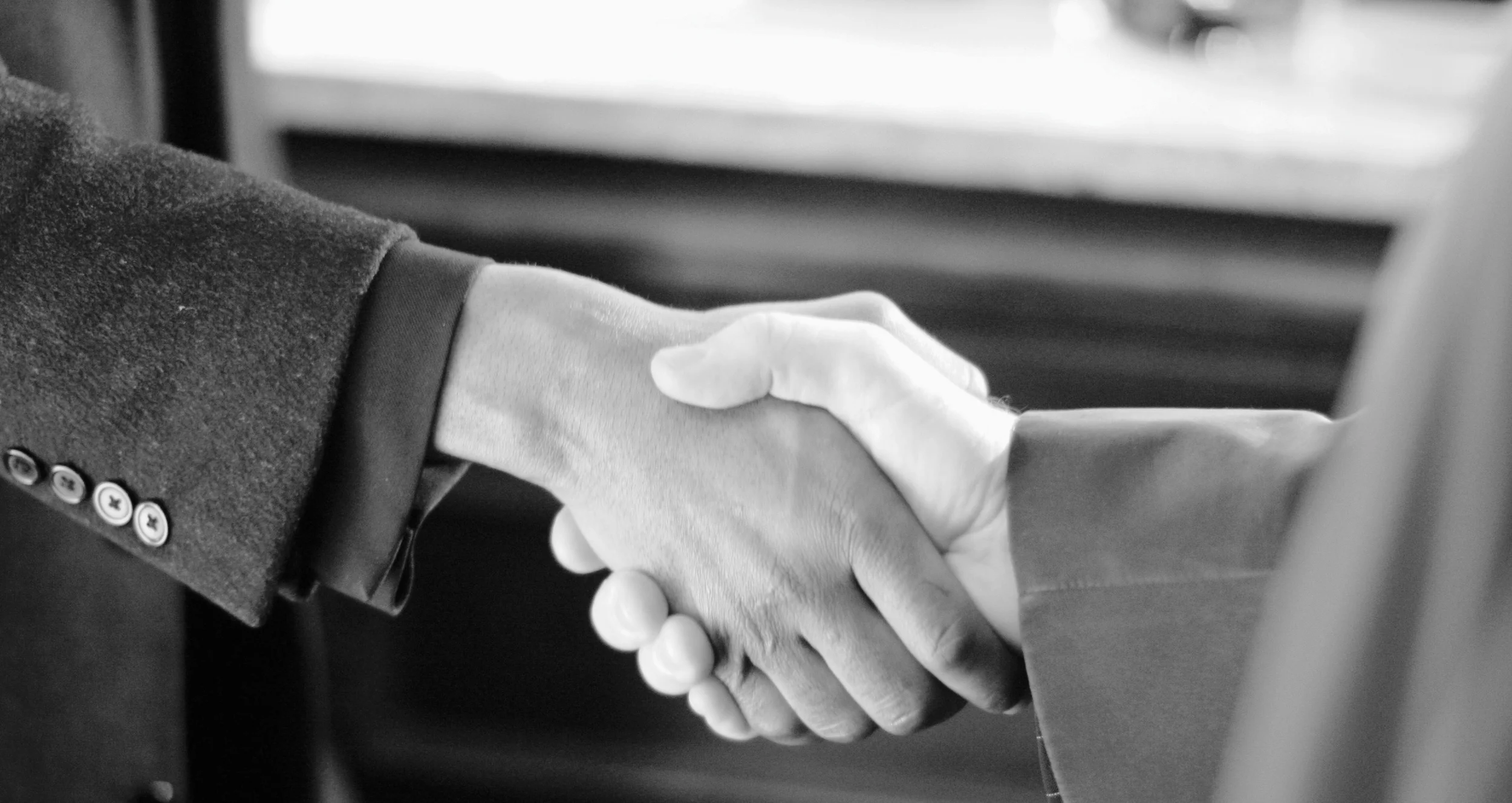 HandshakeCloseupCrop.jpg
