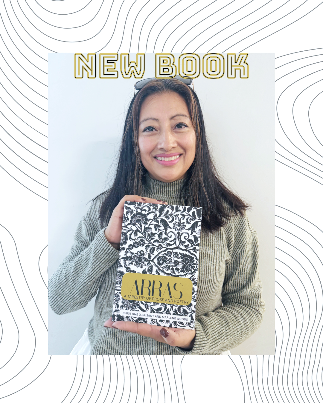 Marlene Woods holding a book title Arras