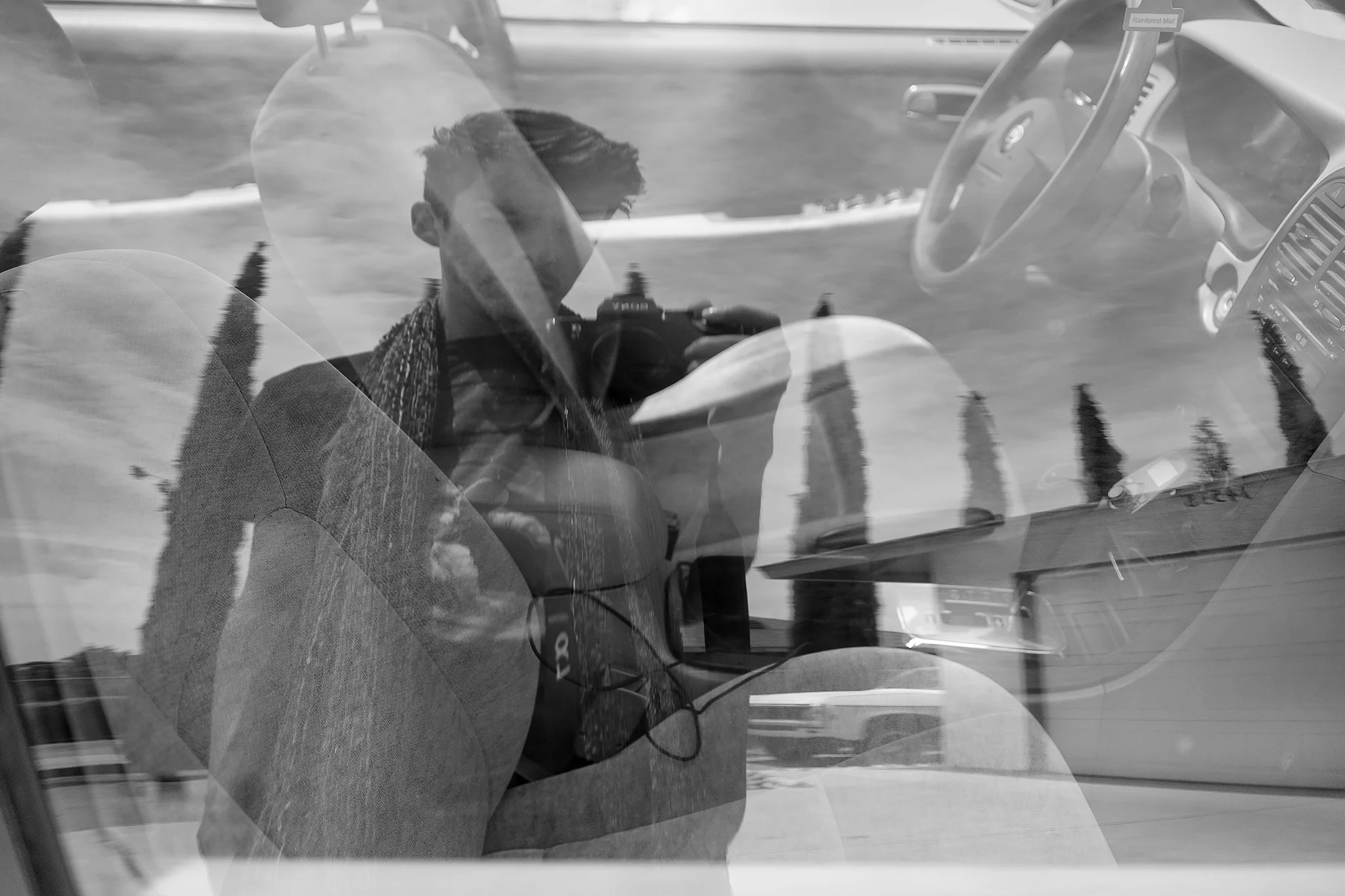 I’m always attracted to the reflections given off from the windows of my vehicle, especially the way these tall trees seem to border my home. This is a view of my current state of being, my home and also my office wrapped into one.
