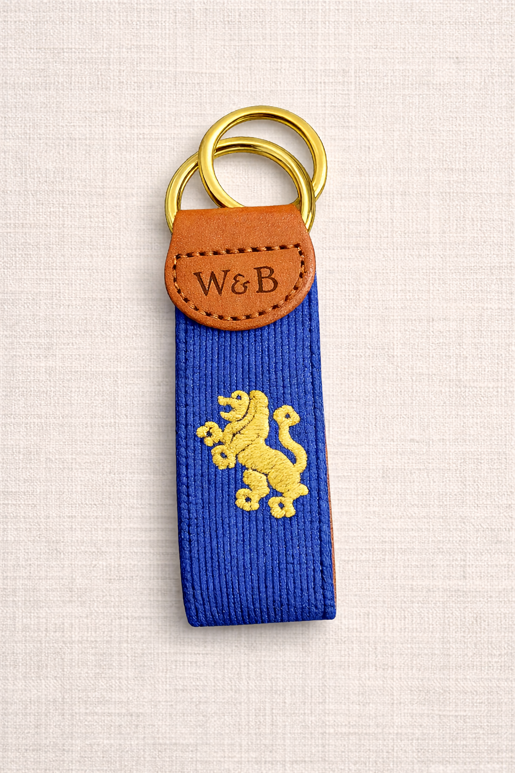 Elegant key fob with lion emblem.png