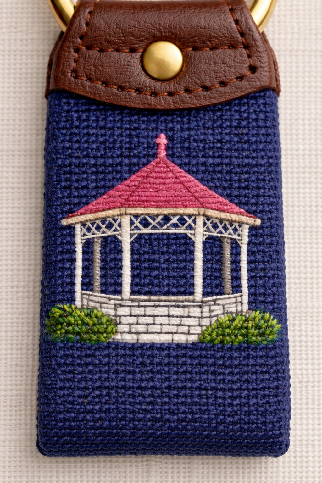 Intricate needlepoint gazebo key fob.png