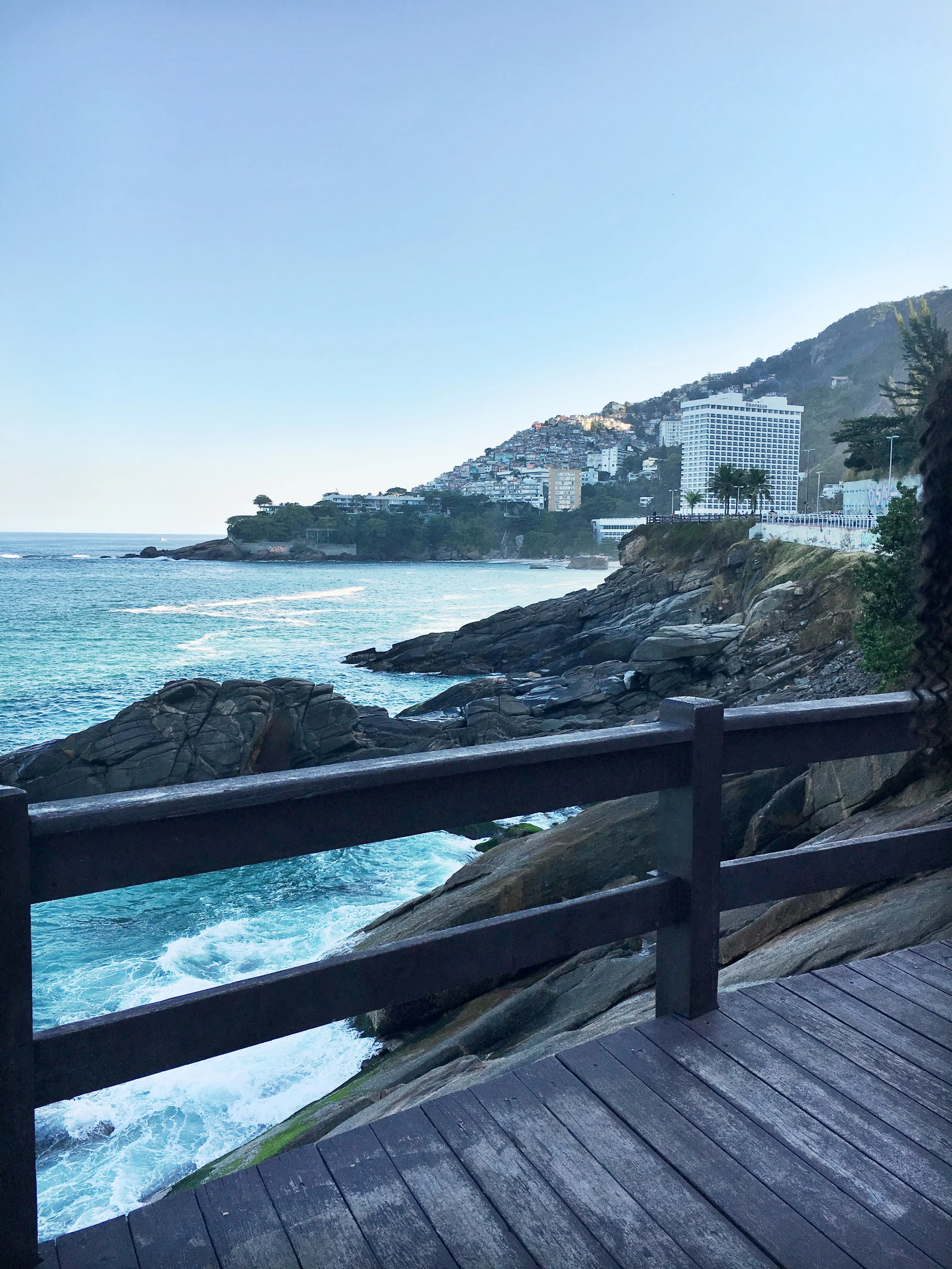 A photo I took of Vidigal favela overlooking the ocean just before sunset. 