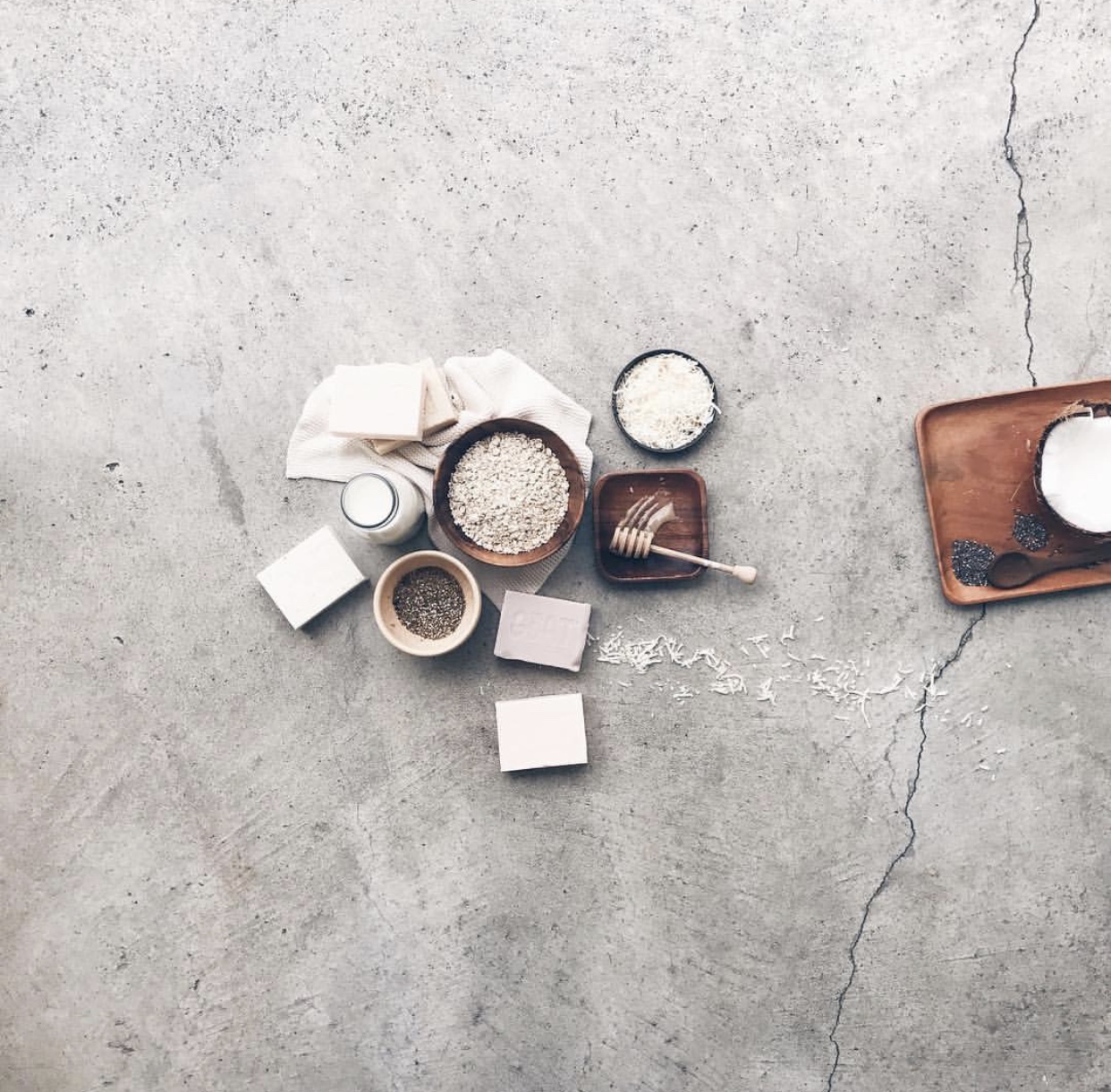 The concrete carport floor provides the perfect amount of texture, interest and aged imperfection for this collection of natural products. By @underthekowhai