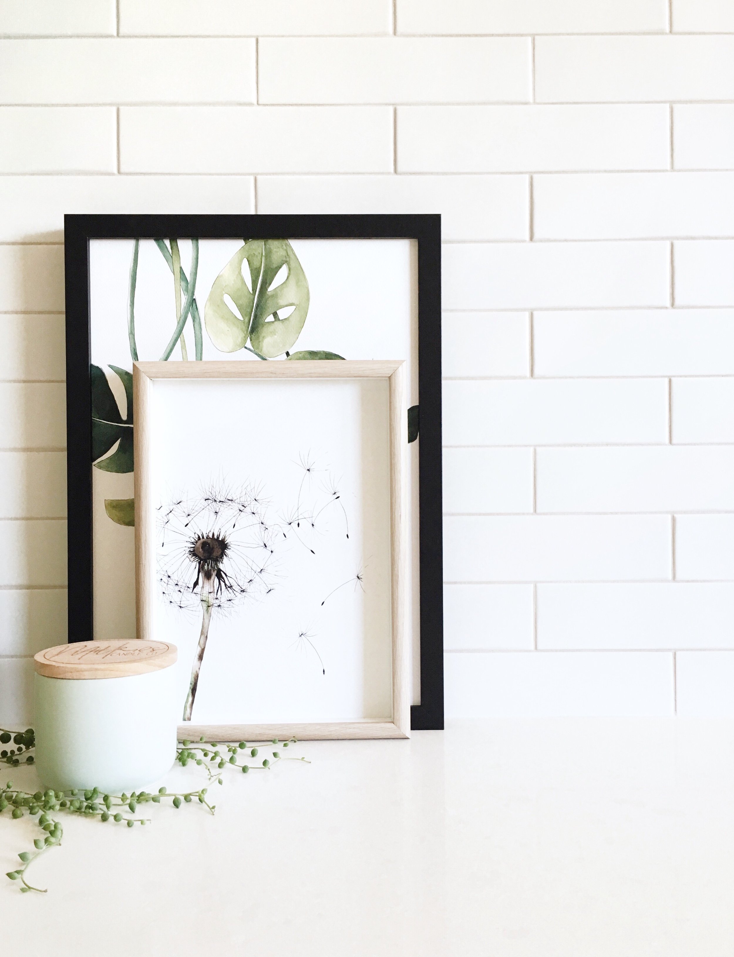 Vignette using prints from @TheLovelyOther, candle from @M ilkies.Candle.Co and my String of Pearls.