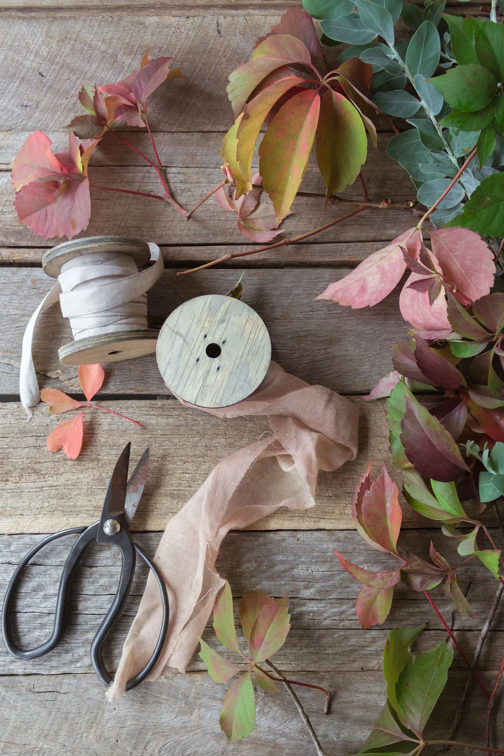 The tools of the trade including some foraged foliage to complement your handmade flowers. Source: Lisel Vonhoff from @bellebouquets