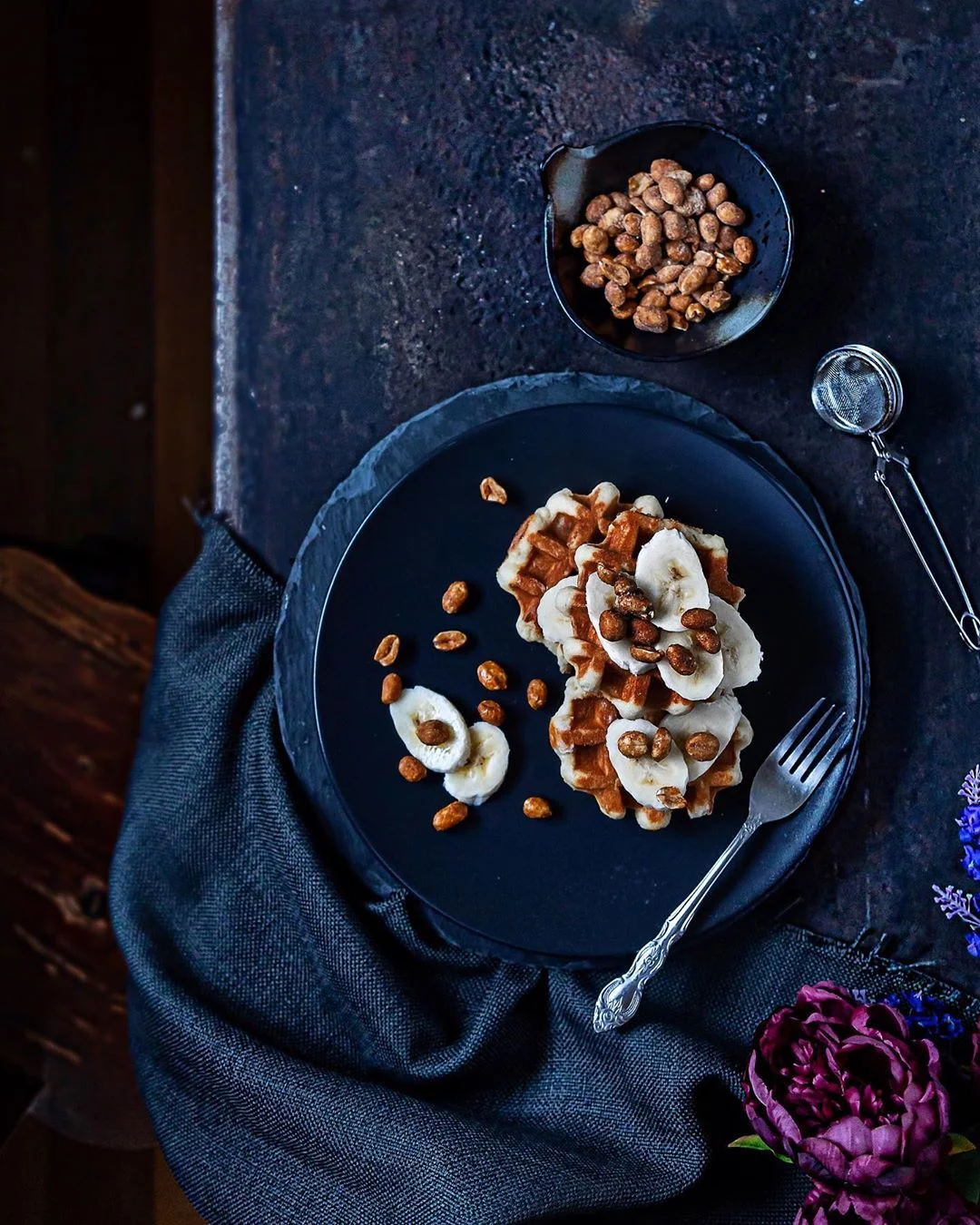 “I loved the tones here, not just deep and moody but also rich and enveloping. The texture on that backdrop is just glorious! Paired with the partially pulled out chair to create more depth, and the contrast of the layers in the dish...pure magic. Draws you right in.” Christall’s words about this amazing image by @emotivelightphoto