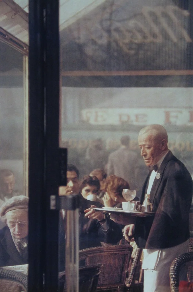 Saul Leiter. First sample in color street photo. Waiter, Paris, 1959