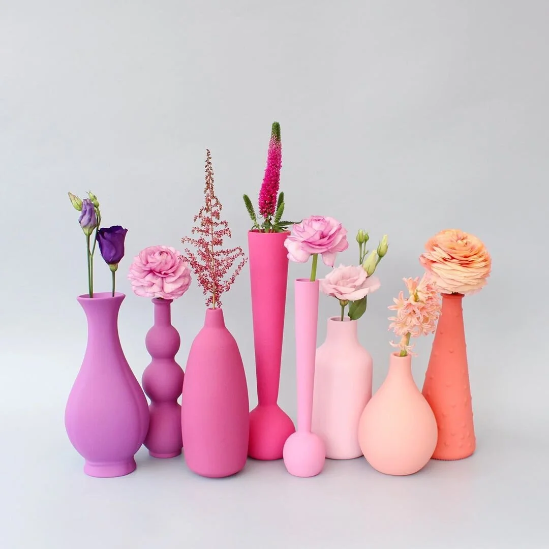 A rainbow vignette of flowers and vases. Source: @caroline_south