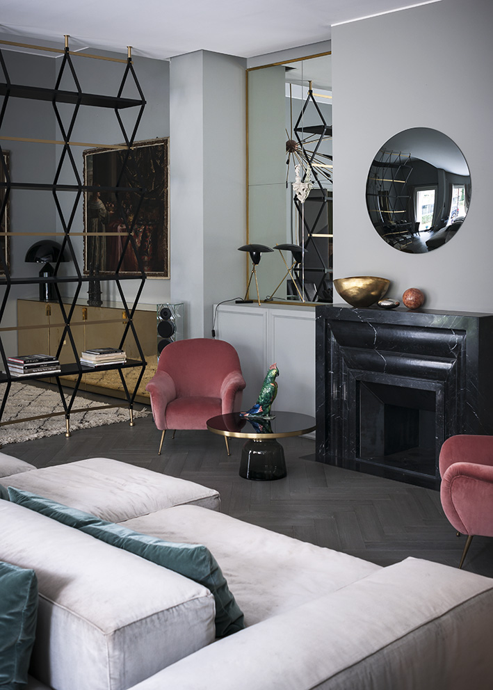 The fireplace and the screen/bookshelf situation are my favs in this space.