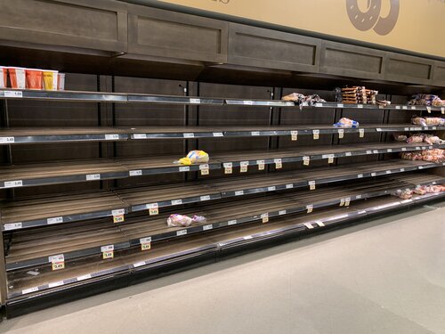 cleared and empty shelves at the supermarket