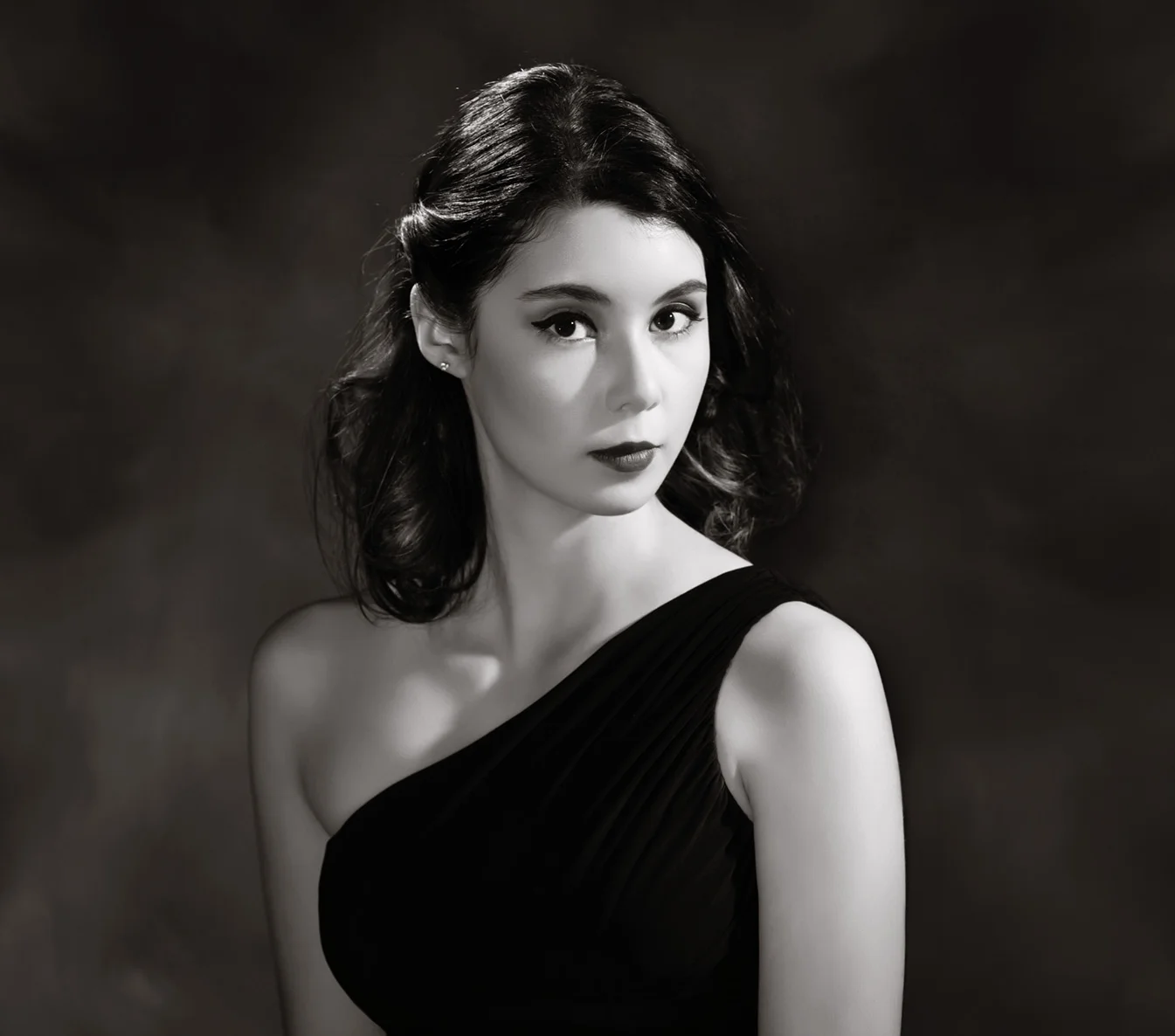 A closer look at Paulina's classic beauty is captured in this Film Noir casting of shadows.