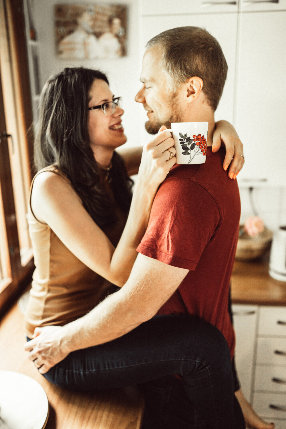 Beautiful couple at in-home photo session in Kuopio, Finland