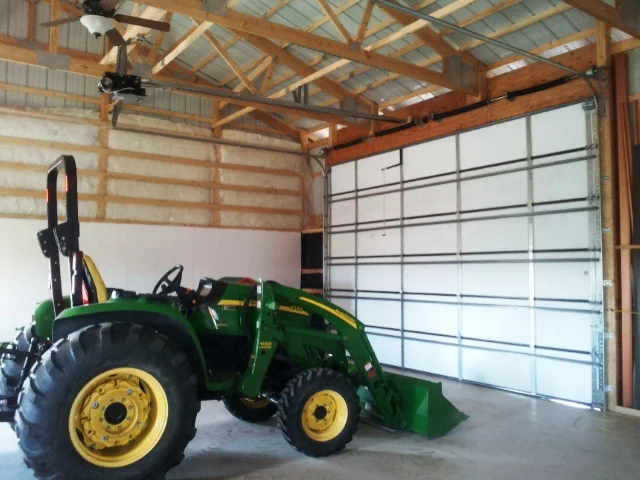 2011-07-16 - Tractor and New Garage Door in New Shop.jpg