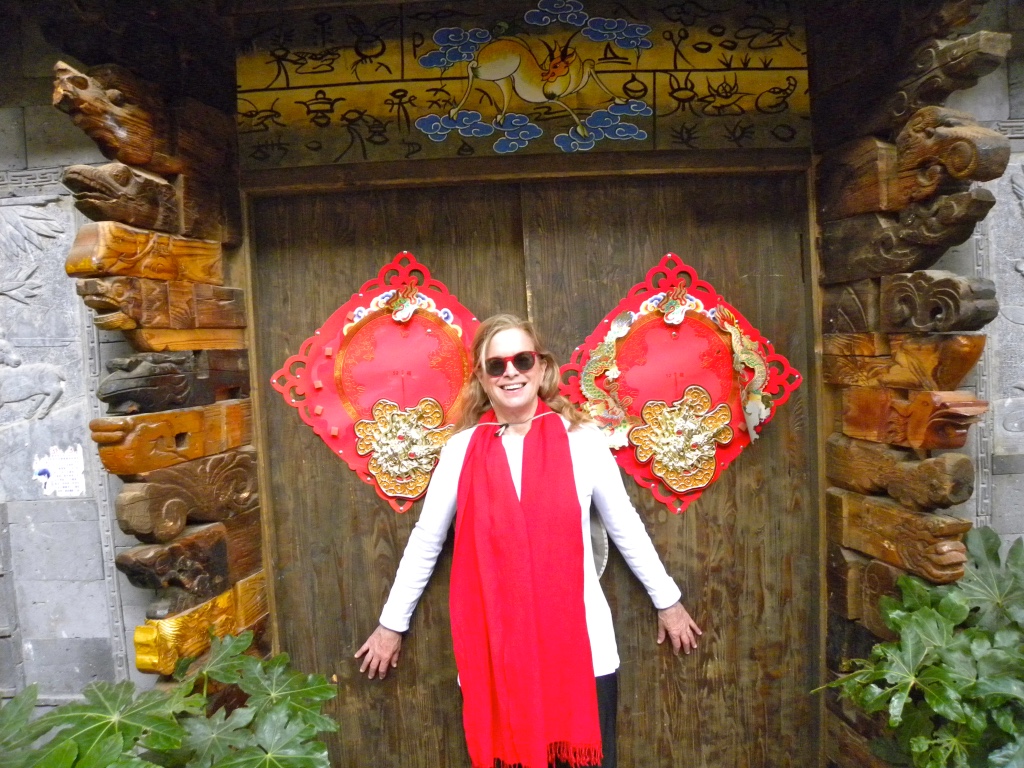 Author in doorway Lijiang Old Town, China