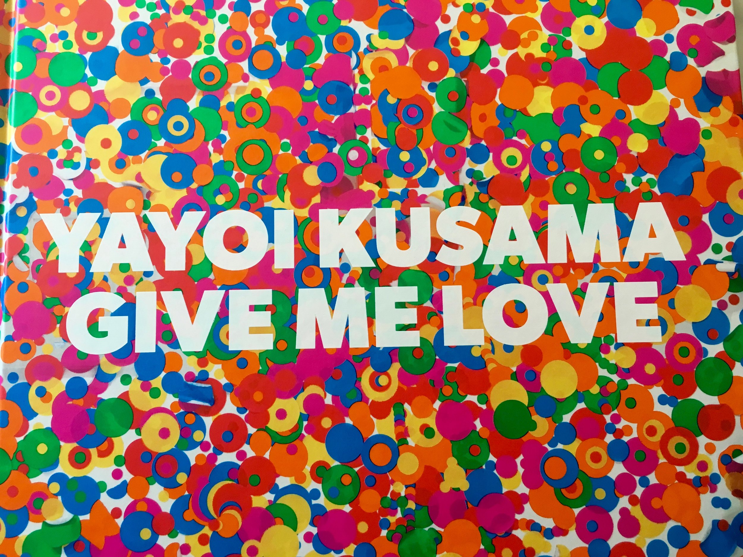 Two weeks ago in Washington, D.C., thanks to a good friend, I got tickets to the sold-out Kusama exhibit at the Hirschhorn Museum. I'm back home in Southern California, but Kusama's powerfully seductive colorful images linger and beckon. Last night when I couldn't sleep (again), I wandered downstairs, sipped hot tea and looked through the pages of her book Give Me Love . I wish everyone could read her introduction where this artist writes...And I want to tell people across the earth: Stop nuclear bombs and wars, now see your shining life With my longing for eternity. Having lived in a psychiatric institute for some 40 plus years, Kusama speaks freely about abusive childhood, her mental illness, and her suicide-prone life. After I googled her and learned that her art explodes from the depths of her mental illness, this new understanding couldn't help but color how I felt about The Obliteration Room, for example.