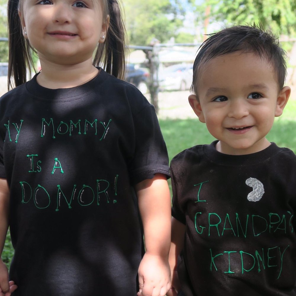 My two youngest showing off how proud they are of their Grandpa and Mommy.