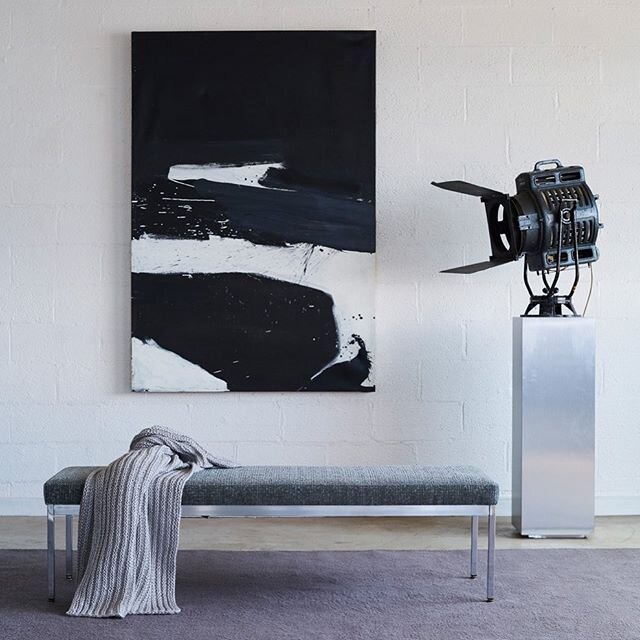 Simplicity reigns...🖤🖤🖤
Striking sense of balance in this vignette featuring large vintage abstract art circa 1960&rsquo;s on linen and vintage chrome bench from Swoon. One of my favorite photos ever taken by @gc_filmimages and styled by @coreygra