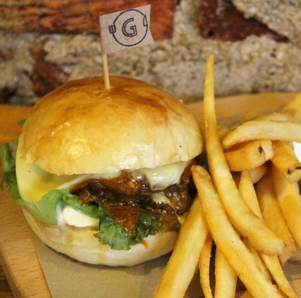 Chicken Curry Burger - Burgers are a typical item in most Western menus, so we felt that the mash-up of Chicken Curry + Burger was a fitting addition to our mash-up creations. Our Chicken Curry Burger features a fried chicken thigh fillet, covered in delicious coconut curry sauce, on our soft homemade burger bun, served with a side of fries and tomato sauce. 