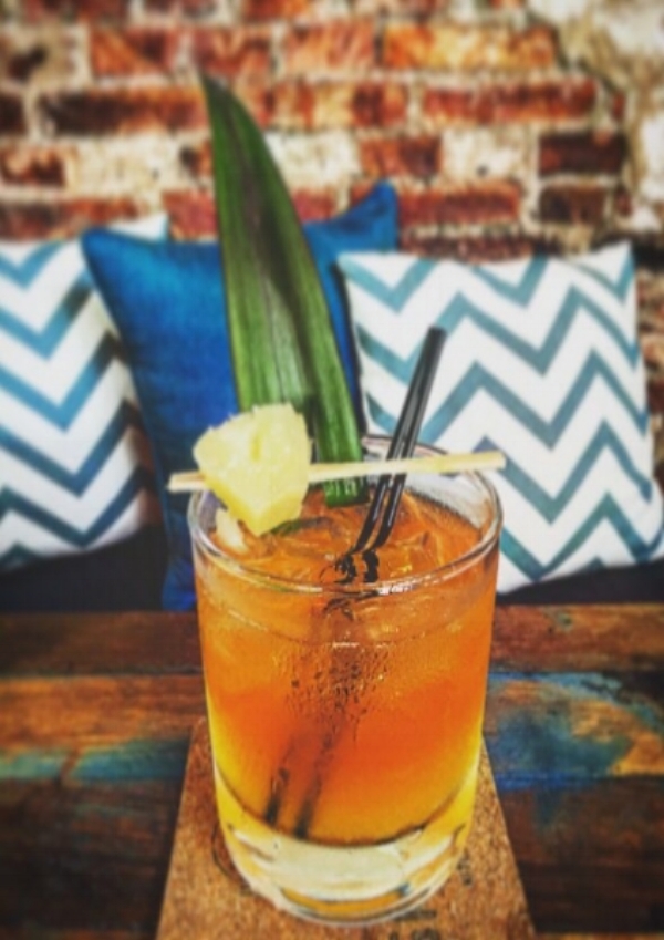 Borneo Bird - Built in a rocks glass; the pineapple juice is contrasted with tuak and a dash of Campari bitters. This has all the tropical notes in a drink and is really popular as an aperitif. 