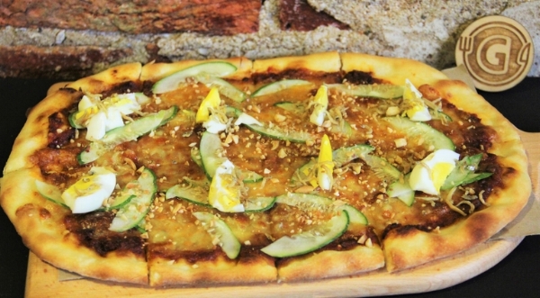 Nasi Lemak Pizza - "Pizza is a national dish of Italy (& America!), and the idea of marrying this with one of the favourite breakfast staples of Malaysia; the mashup flavours of sambal tomato sauce, crushed peanuts, fried anchovies and slices of egg and cucumber on top of our homemade pizza base. This is definitely one of our favourite mashup creations!"