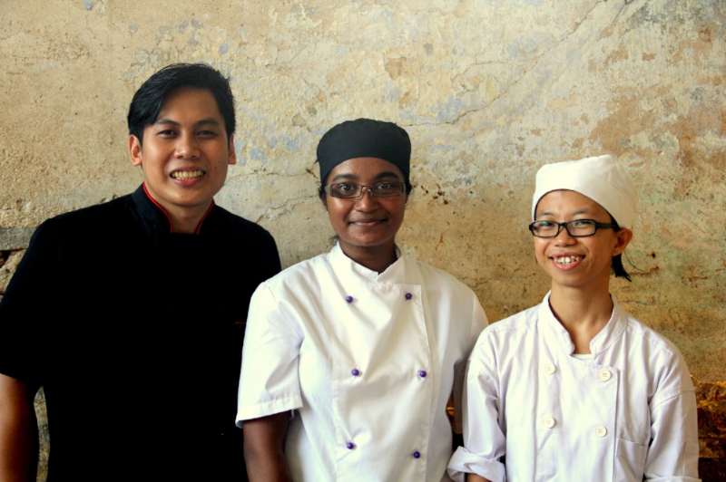 " The kitchen team at The Granary is headed by Head Chef Lutonia Naicker (center) together with her Sous Chef Marthineus Langi (left) and also the Pastry Chef Monica Nani (right). Our team is a melting pot of cultures and experiences; from Sarawak, South Africa, New Zealand, America, China and Hong Kong. We all come from different backgrounds and ambitions, Lutonia would like to impact underprivileged youth through her love of food, Martin aims to put Bornean cuisine on the map and Monica just loves all things baking and genuinely enjoys creating sweet treats! Together they hope to share their passions and make their mark on Sarawak!"