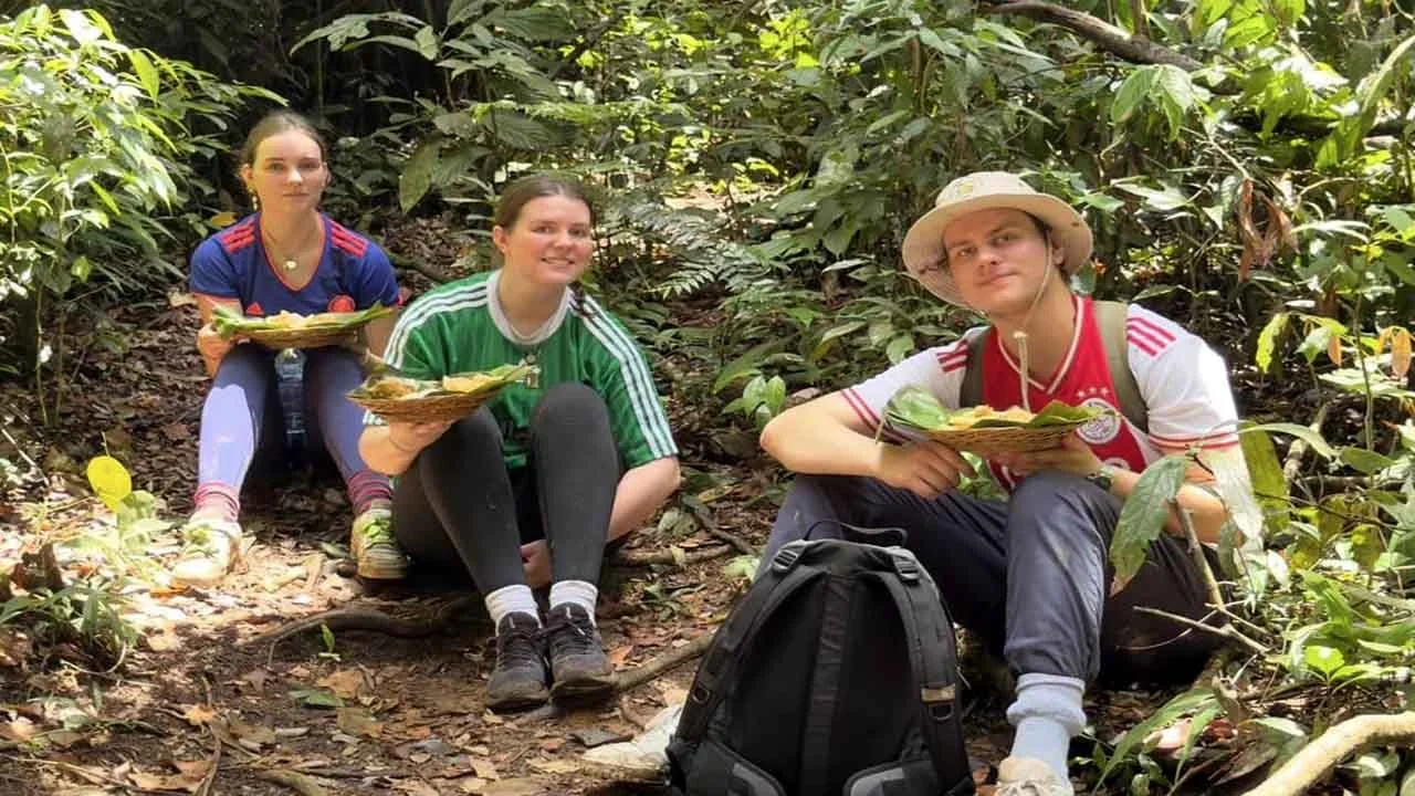 Group photo after completing a half-day ethical and eco-friendly jungle trekking experience in Bukit Lawang, Sumatr