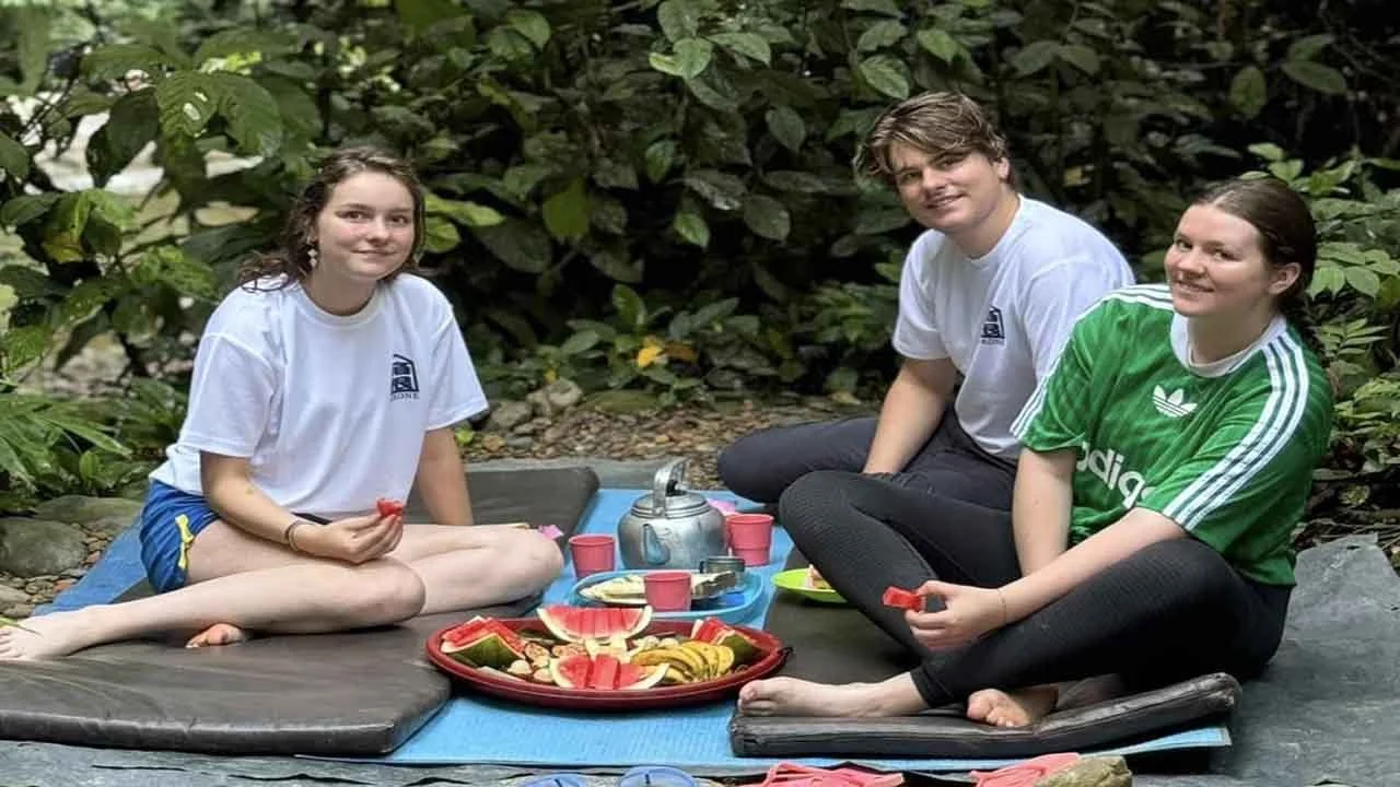 Group photo after completing a half-day ethical and eco-friendly jungle trekking experience in Bukit Lawang, Sumatr