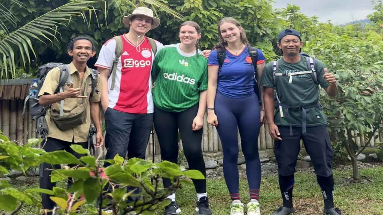 Group photo after completing a half-day ethical and eco-friendly jungle trekking experience in Bukit Lawang