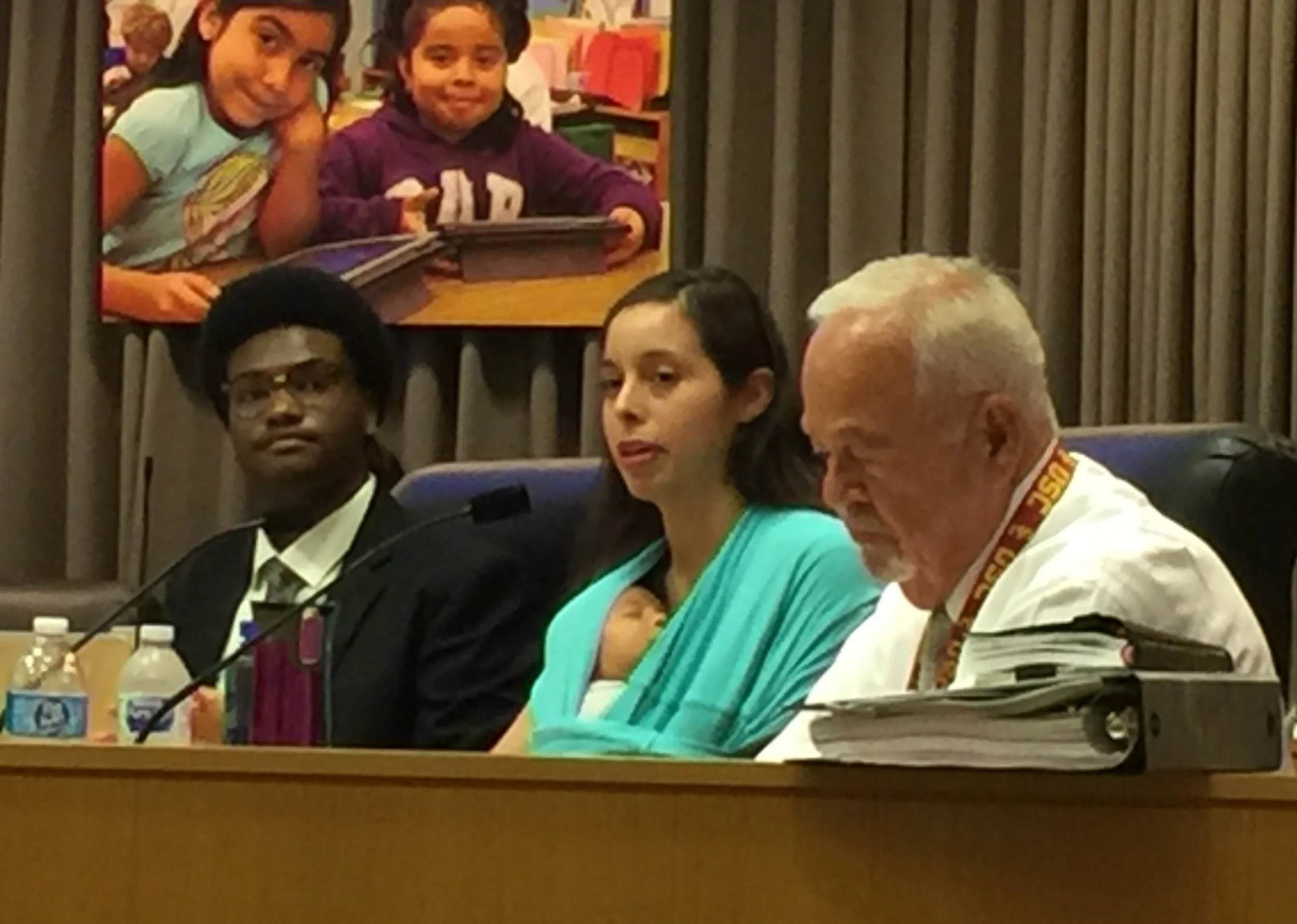 Student Board Member Tyler Okeke (left) with Board Members Kelly Gonez and Richard Vladovic