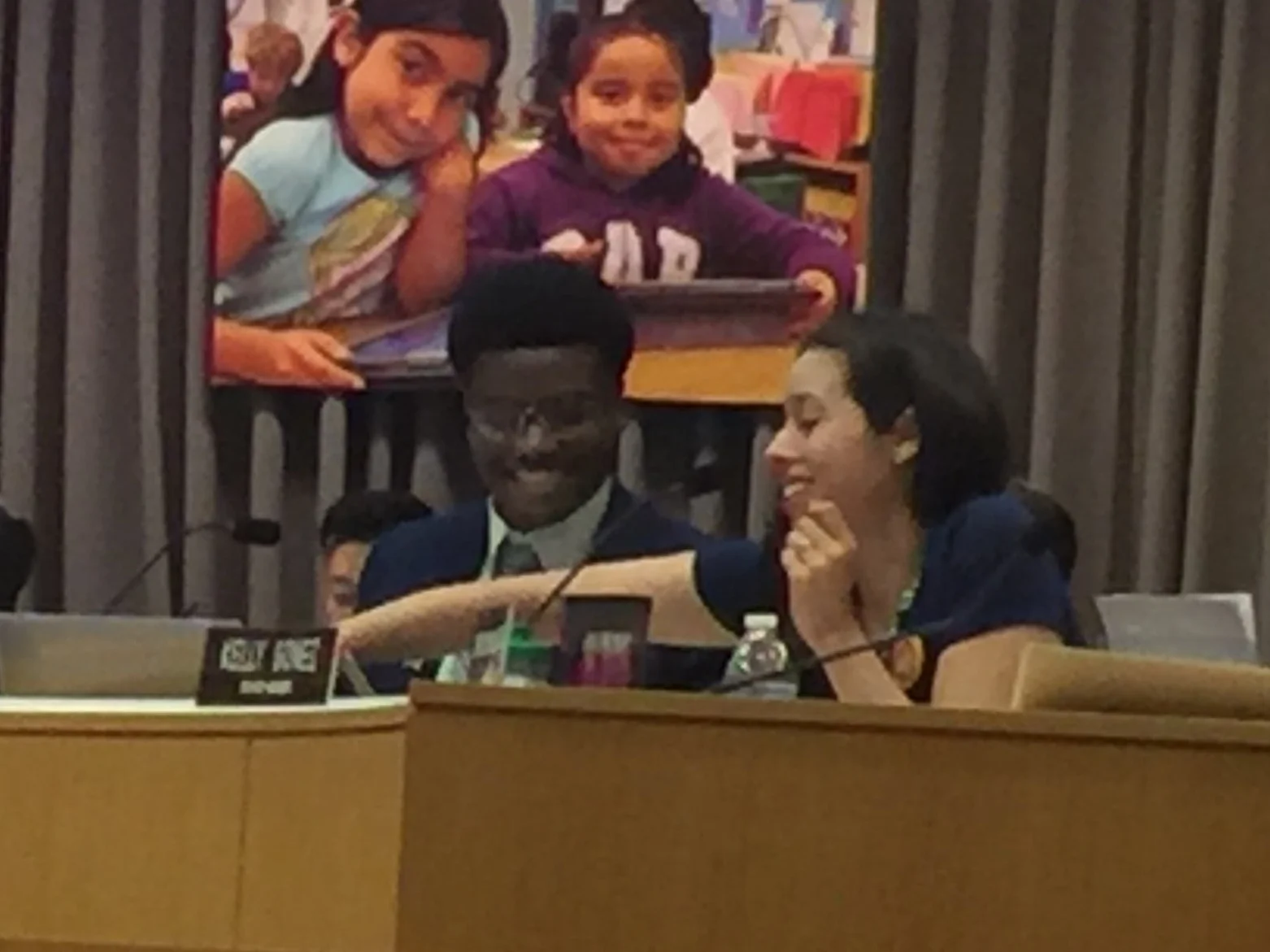 Student Board Member Tyler Okeke (left) authored the resolution to explore expanding school board voting rights to students age 16 and up.