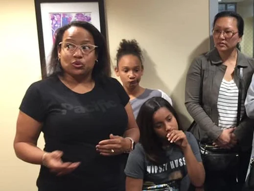 Tinisha Briley Landry of Inglewood (left) was one of 30 Speak UP parents and students who visited Assembly Member Autumn Burke’s office Friday to protest the passage of AB 1505, a bill that would take away quality school options for families. The bill now heads to the state Senate.