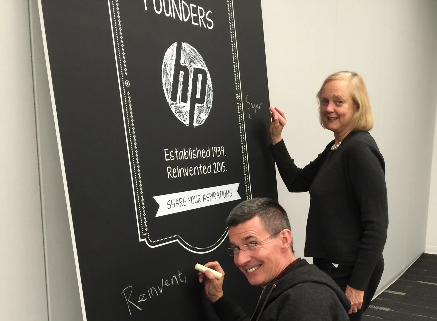 HP Inc. board member Meg Whitman signing a Founders Wall 
