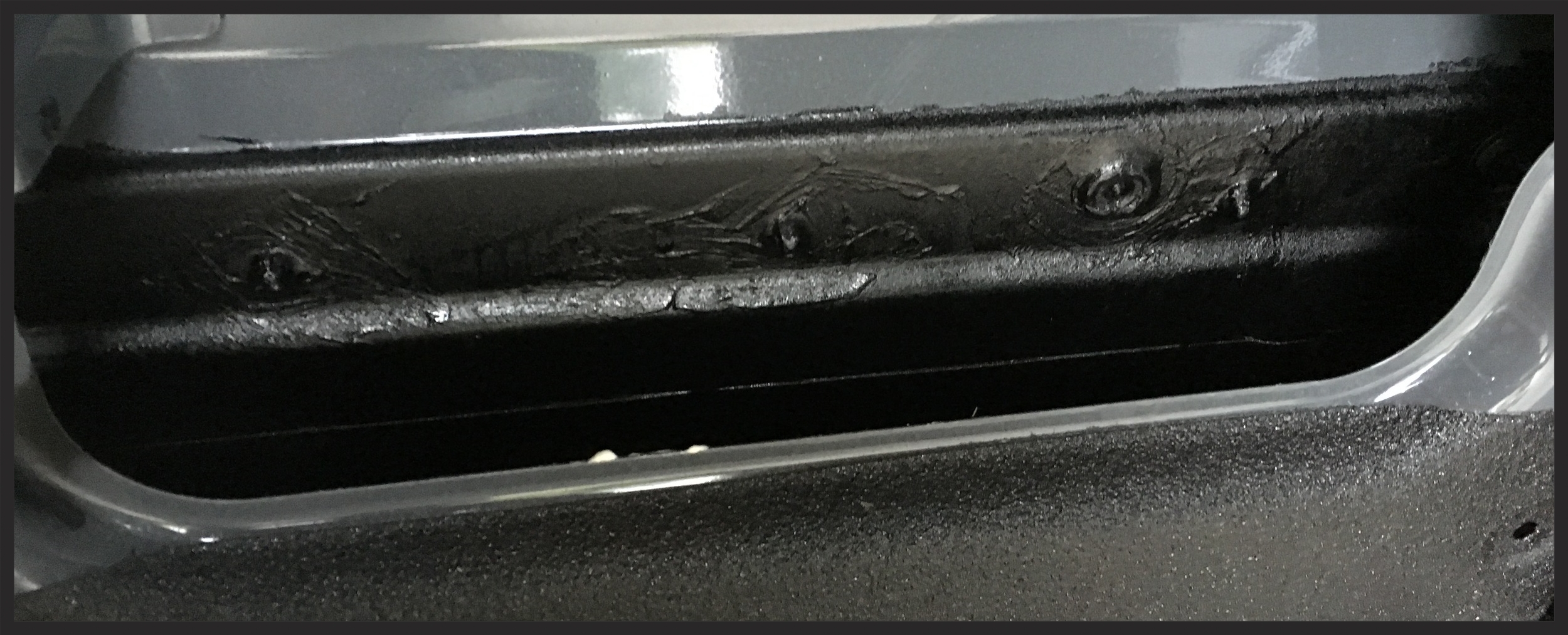 plastic coating applied over the trim clips