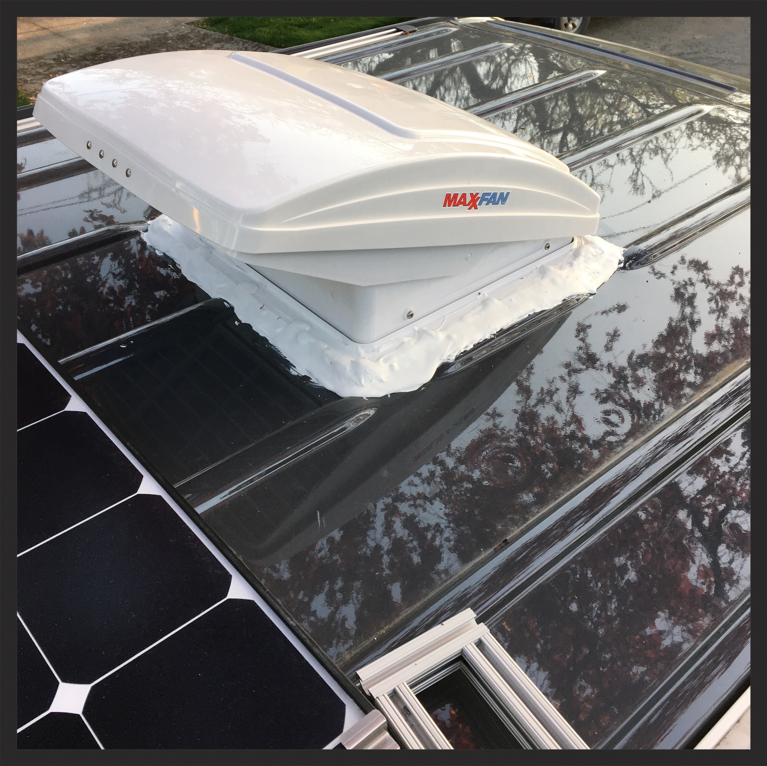 I dumped a ton of dicor sealent on the vent, but you can't really see it up there