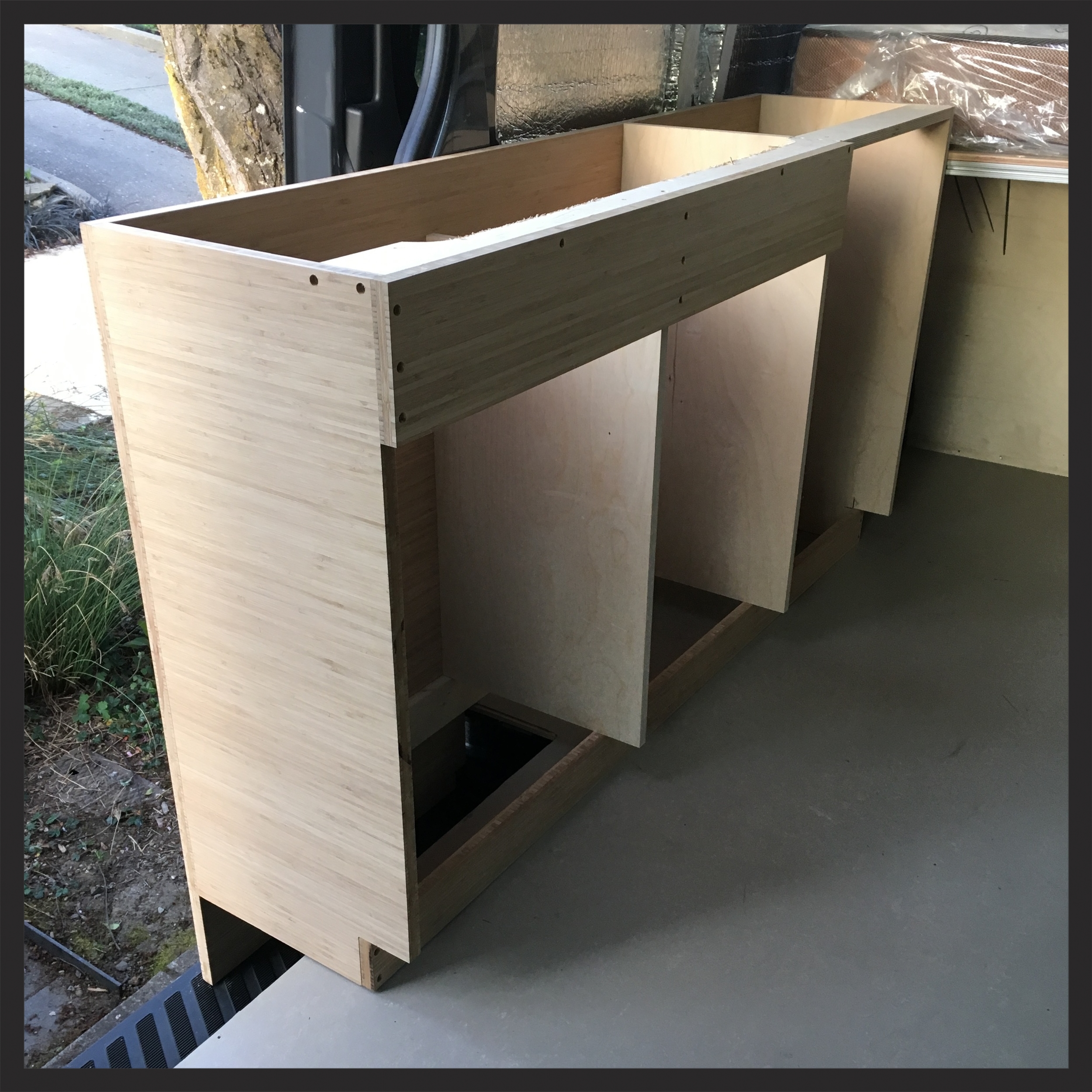 The center will have the sink above it and will have a door in front, the left and side will be drawers.