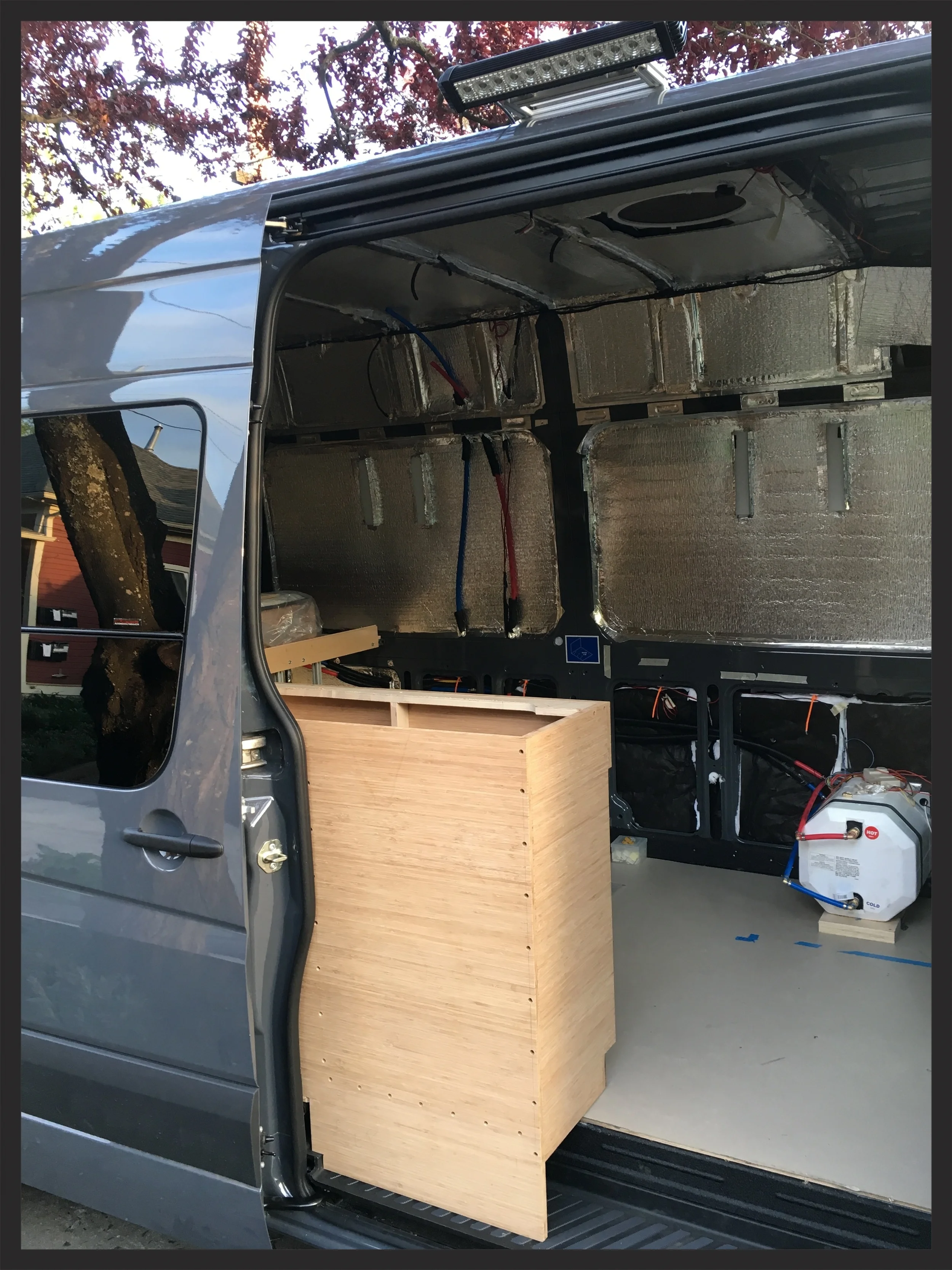 The cabinet extends about two feet into the slider space.