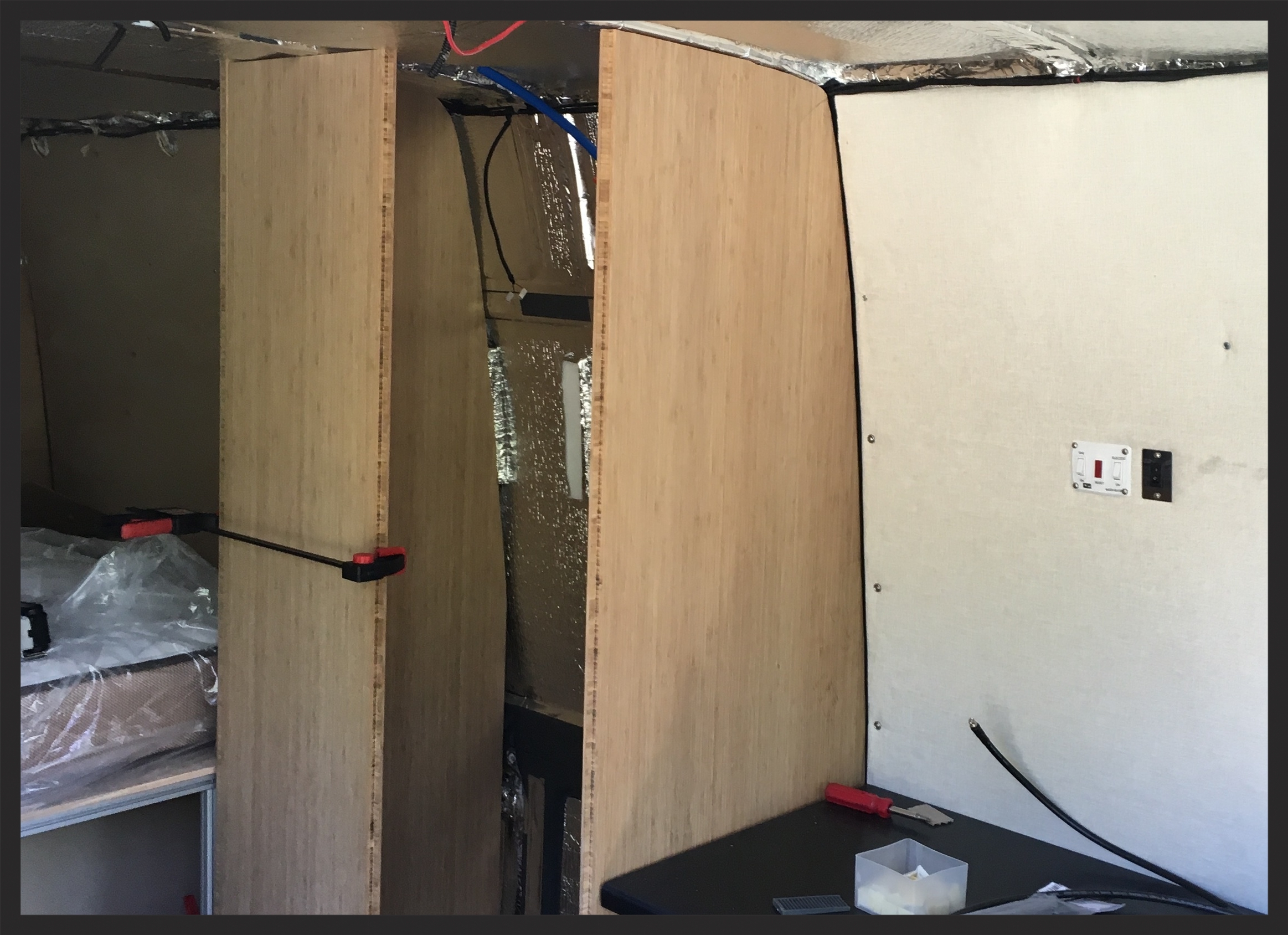 some floor to ceiling boards make quite a difference in how the space feels in the van