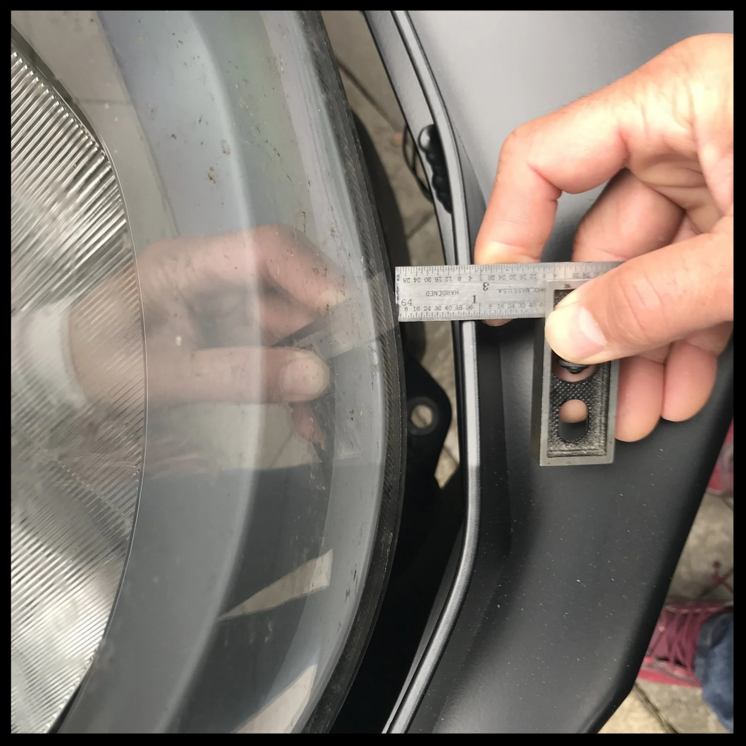 looking down into the canyon of a gap between the van and the bumper. This is pretty bad, but I could live with it if it was just off fore to aft.