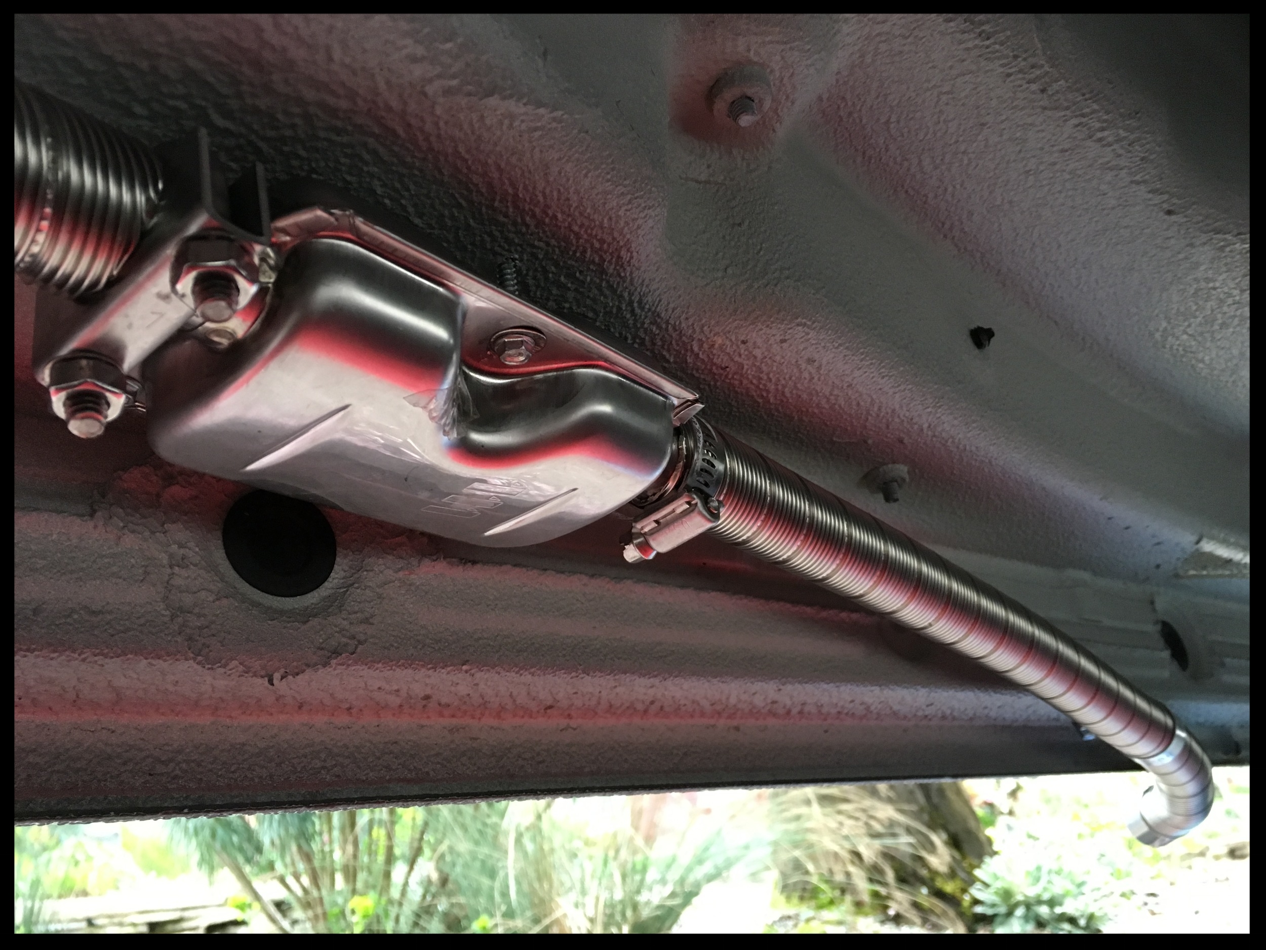 The muffler and exhaust secured