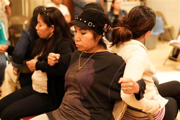 Participants in a workshop organized by the New Sanctuary Movement Coalition hold a workshop in Judson Memorial Church in New York lock arms in an exercise to remind the of the importance of being connected with others. The exercise is part of an effort to prepare immigrants for life under a Trump administration and provide them support. New Sanctuary Movement Coalition / New Sanctuary Movement Coalition
