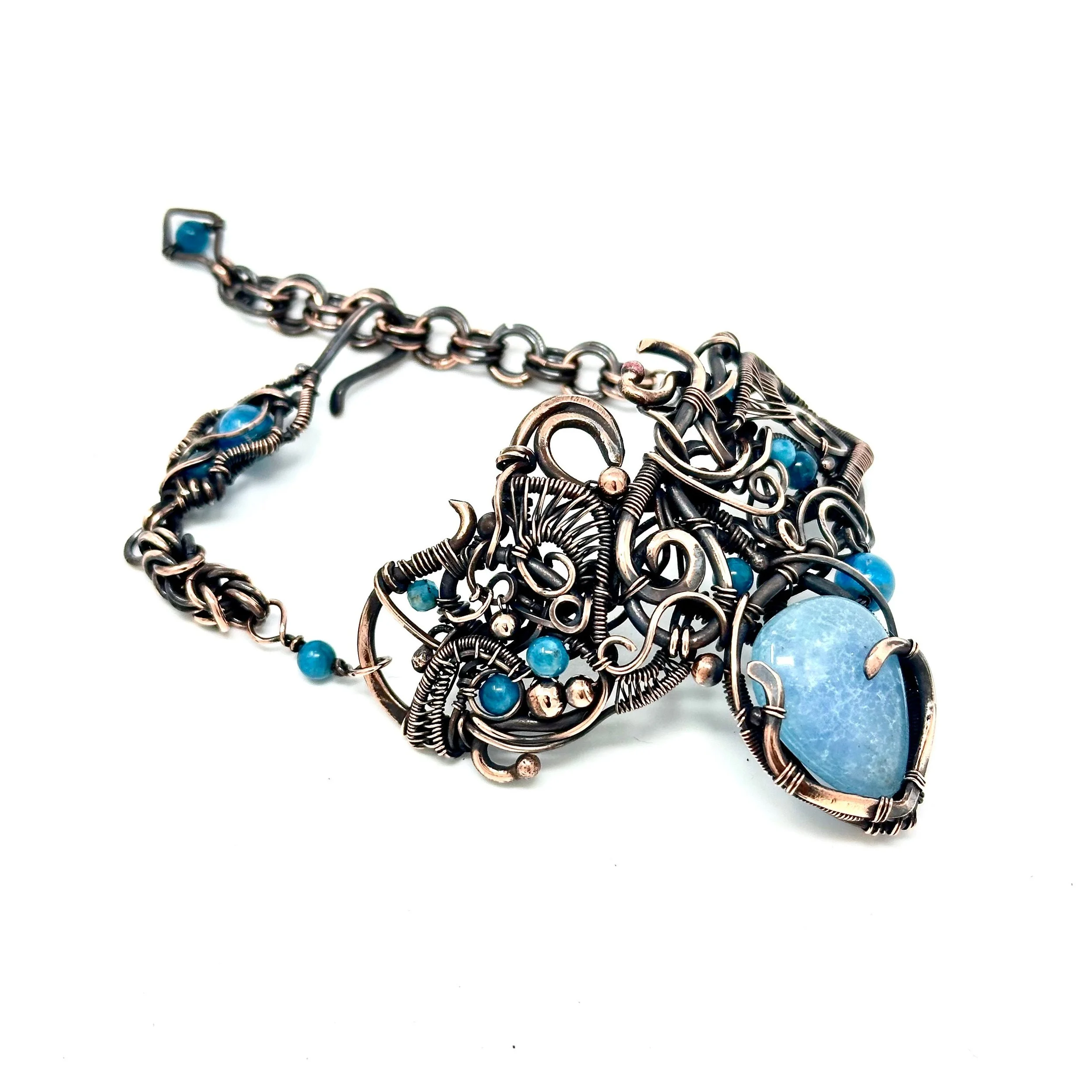 Handmade copper wire wrapped bracelet cuff with Blue Jade and Apatite gemstones — $89