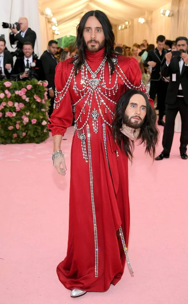 Jared’s date was a wax bust of his own head (as seen on the runway ), flowing locks and all.