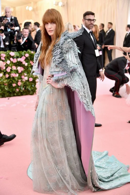 The music maven gained her wings from designer Alessandro Michele.