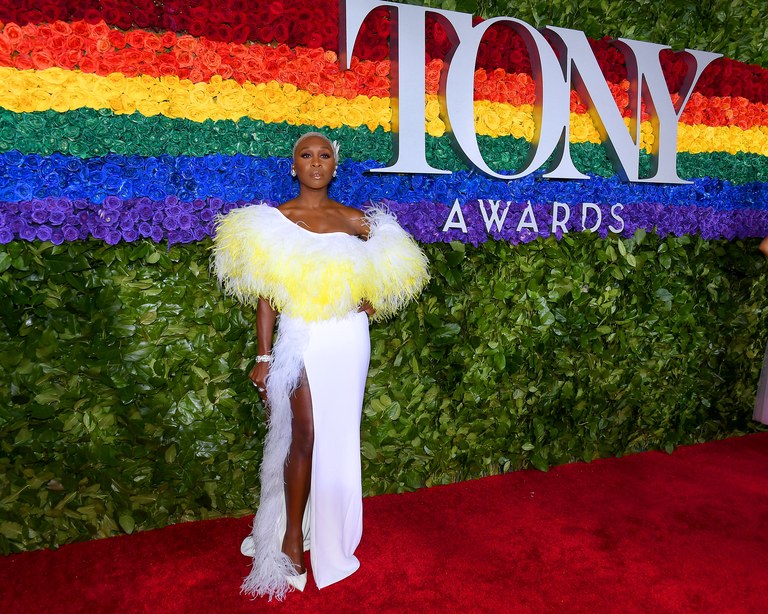 The Emmy, Grammy, and Tony Award winner stunned with this custom feathery creation before changing for the In Memoriam, where she sang “Can You Feel The Love Tonight”.