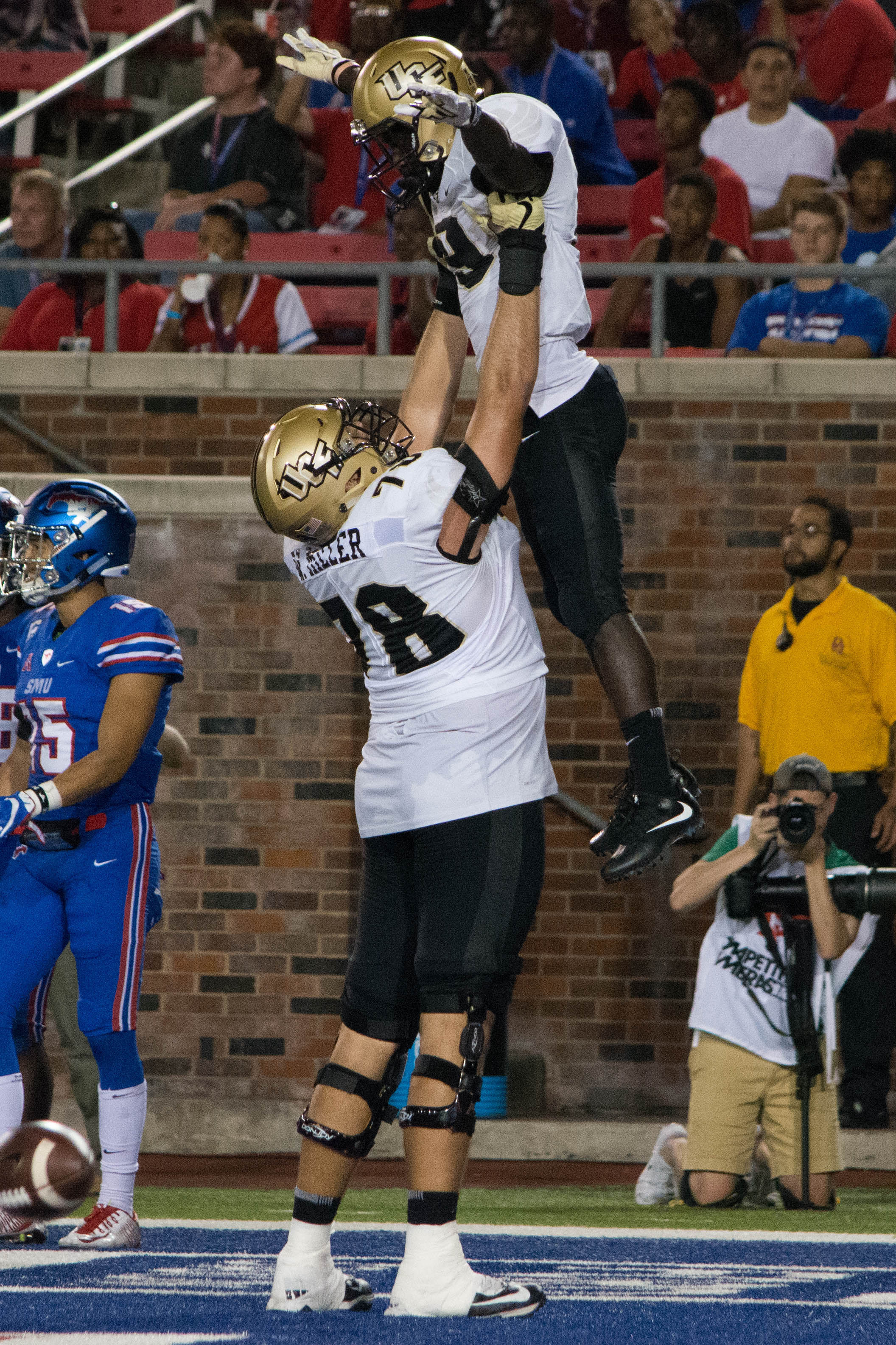 Wyatt Miller celebrate with Adrian Killins Jr. in the endzone.