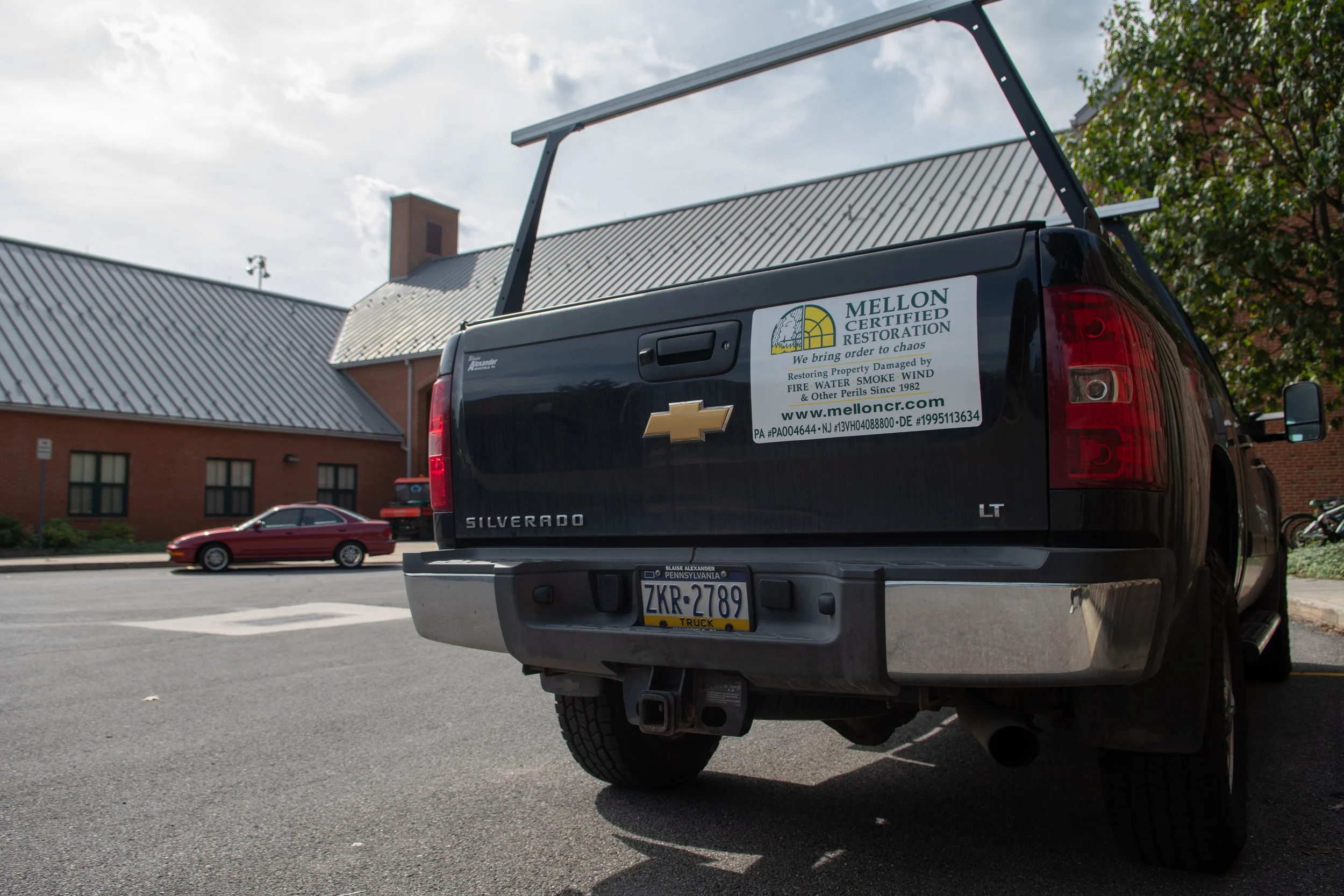 Photo by: Noah Riffe (10/1/2018) - Mellon Certified Restoration property damage repair truck outside Penn State Altoona dorm Cedar Hall on Monday, Oct. 1st, 2018 as an outbreak of mold forces students to move out.