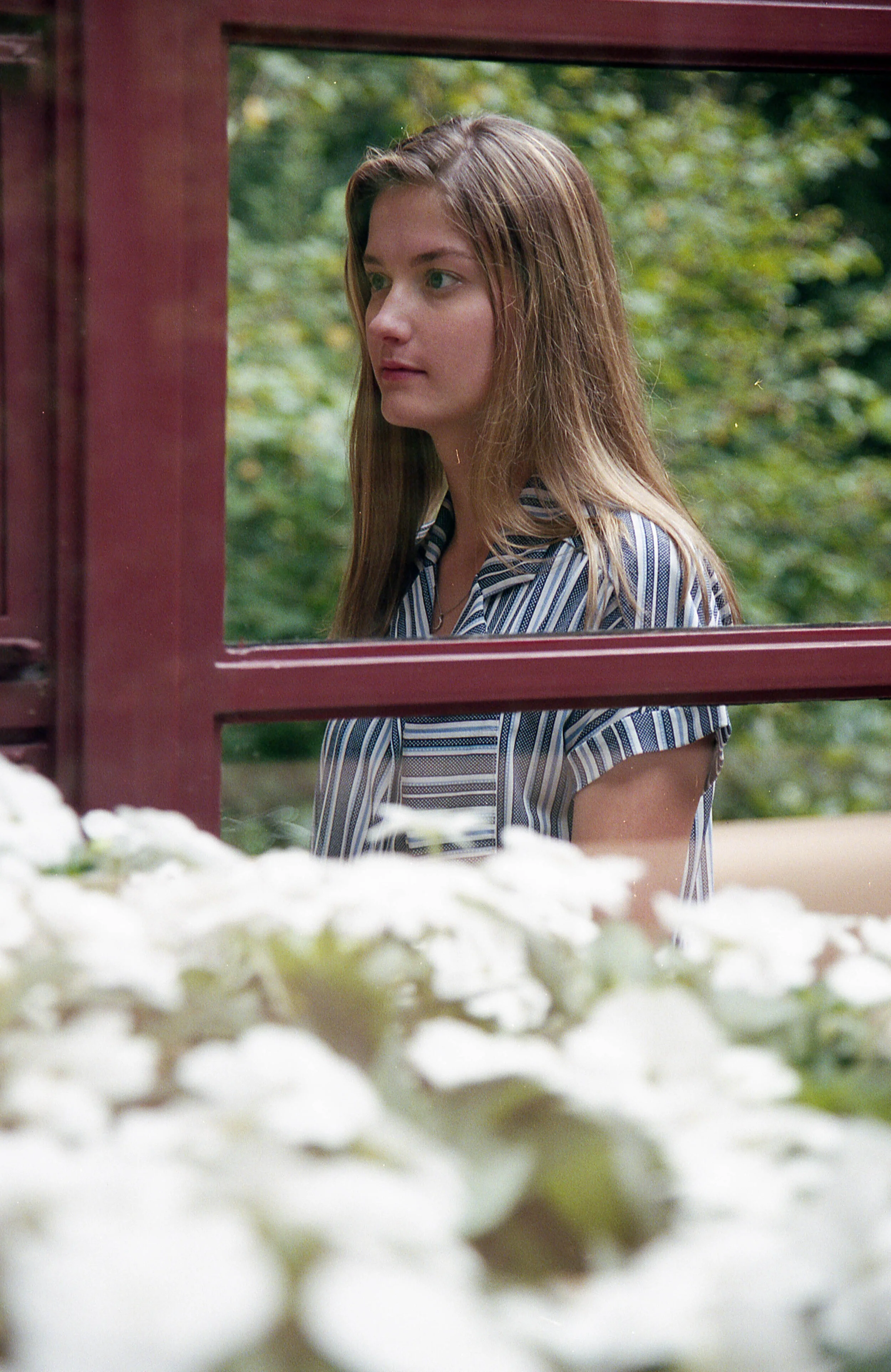 Erin Hogge poses on the balcony of Frank Lloyd Wright’s Falling Water home on Sept. 8, 2019 in Mill Run, Pa. | Photo by: Noah Riffe | Shot on: Nikon F100 with Portra 400
