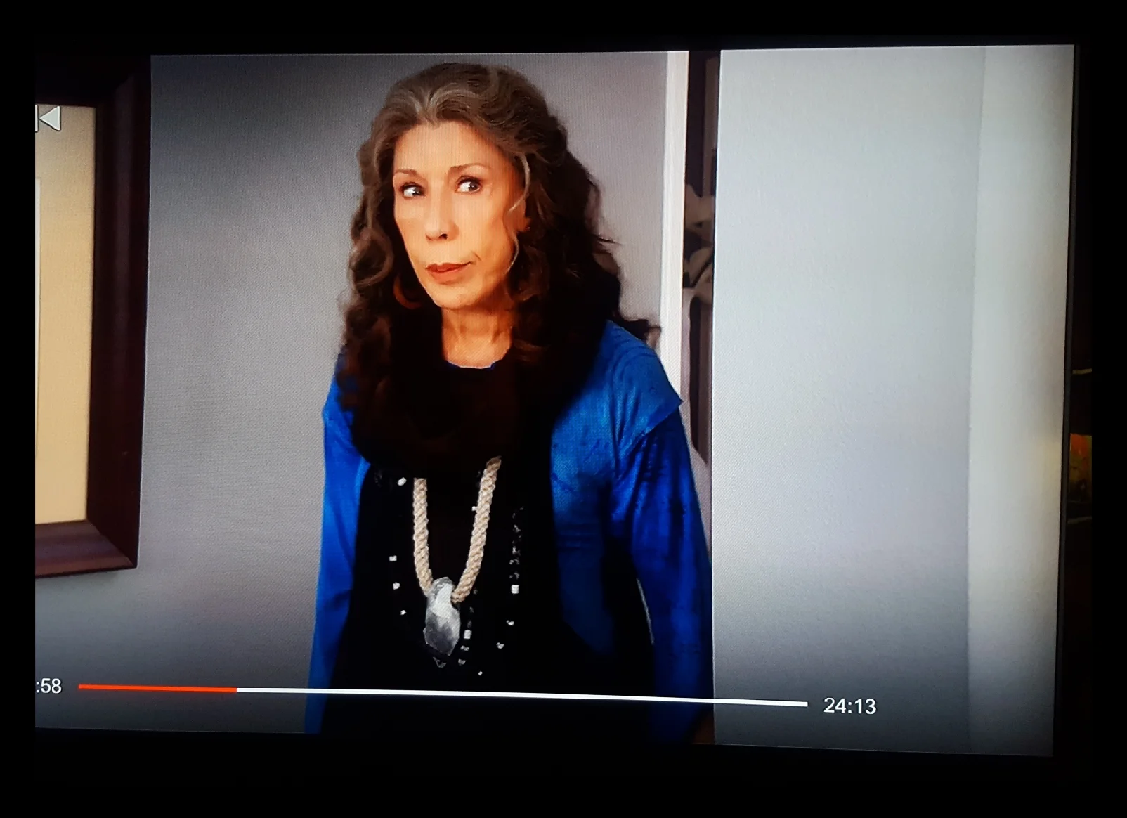 Episode 5: Neon Zinn lariat necklace paired with an Adina Mills crystal necklace.