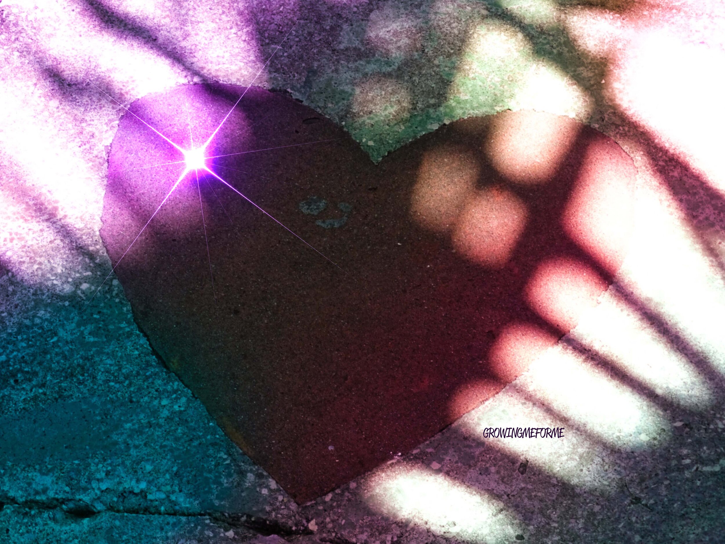 Close-up of a textured surface with colorful paint splatters in purple, green, pink, and white. The words 'Growing Me' are written in small letters at the bottom right corner.