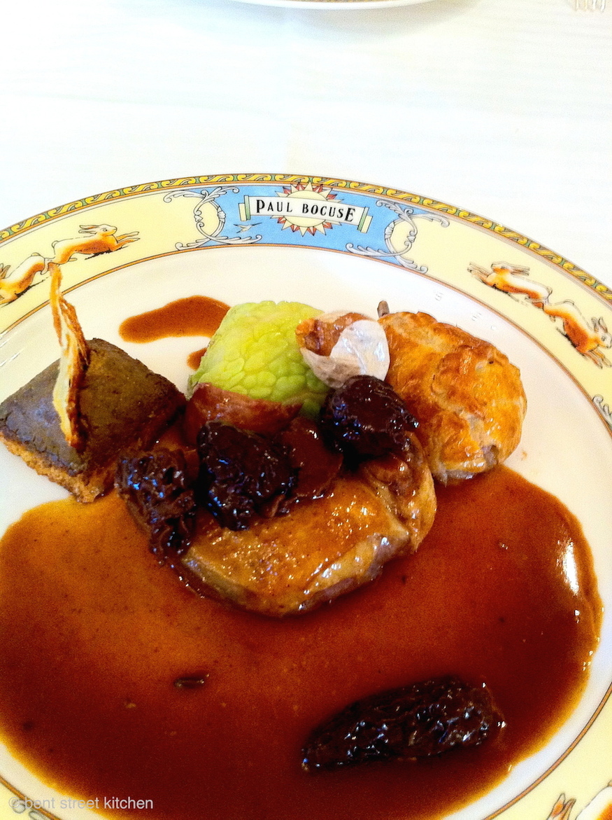 Pigeon in puff pastry with young cabbage